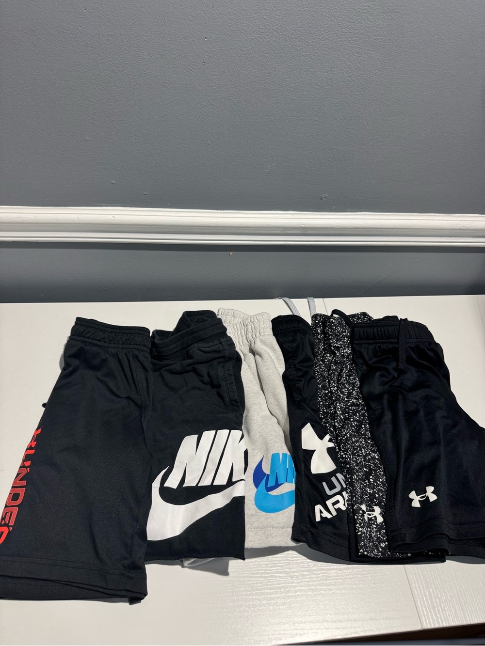 Under Armour Black kids Athletic Shorts with White Logo